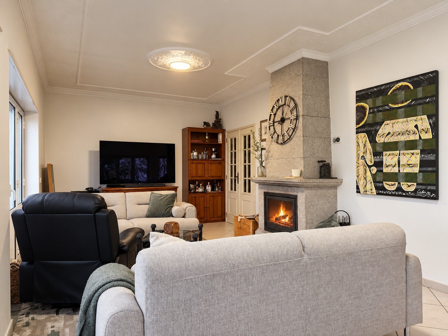 Living room with fireplace and seating